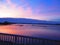 Fishing stakes on Fjord in winter twilight