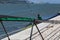 Fishing stand with angling rods on promenade