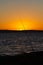 Fishing at sunset on the beach of Porto Botte