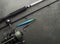 Fishing tackle background with fishing rod