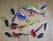 Fishing tackle, Different spinners for a bait of fish on wooden background