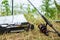 Fishing tackle on the river bank, bait rod, spinning rod, fish. Selective focus