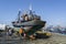 A fishing trawler sits in dry dock at the busy fishing port of Essaouira in Morocco.