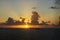 A fishing vessel sailing into the sunrise in Ft.Lauderdale, Florida.