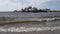 The fishing village on the bank of the North Sea, old boats of fishermen and wooden houses, Russia,Gulf of Finland,Slow