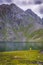 Fishing at Vishnusar lake on Kashmir great lakes trek in Sonamarg, India.