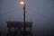 Fishing wooden hut in winter fog by night. Valli di Comacchio, Italy.