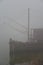 Fishing wooden hut in winter fog. Valli di Comacchio, Italy.