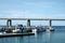 Fishing yachts parked at dock with a bridge connecting Phillip Island with San Remo area