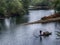 Fishman rowing boat in canoe Lantern
