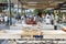 Fishmongers and seafood sellers in semi-outdoor, open air seafood market near Palm Deira metro station in Dubai