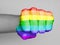 Fist of a man punching, rainbow flag pattern