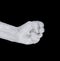 Fist painted with white paint, hand isolated symbol, arm