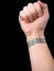 Fist With Wrist Tattoo in Greek Key Pattern over Black Background