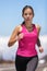 Fit athlete running woman runner jogging outdoor