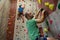 Fit athletes climbing wall in club