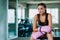 Fit beautiful young woman muay thai boxer exercise class in a gym. Healthy, sport, lifestyle, Fitness, workout concept. With copy