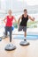 Fit couple working on bosu ball