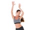 Fit and fancy free. Studio shot of a sporty young woman with her arms in the air isolated on white.