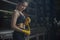 Fit Female strap on her wrist and exercise hard to strengthen muscle.Boxing Woman prepare to trianing session and kickboxing,