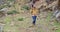 Fit healthy young woman hiking on a trail