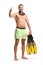 Fit man in swimwear with a diving mask and snorkeling fins gesturing thumbs up