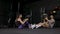 Fit and muscular couple exercising with medicine ball at gym slow motion.