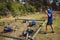 Fit people crawling under the net during obstacle course