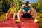 Fit runners resting on stairs after jogging