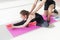 Fit woman high body flexibility stretching her leg