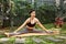 Fit woman improving flexibility