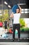 Fit Woman Lifting Barbell Plate