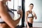 Fit Woman Posing for Selfie in Gym