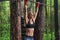 Fit woman preparing to do pull ups on horizontal bar.