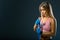 and fit woman preparing for training. girl wraps a boxing bandage on her arm