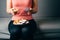 Fit woman snacking with sugary food