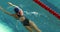 Fit woman swimming in swimming pool