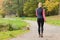 Fit woman walking in park