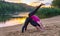 Fit young women performing acrobatics yoga