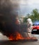 Fiteman in a fire proximity suit puts on fire.Fireman in a fire proximity suit which made to protect him from hazardous materials