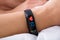 Fitness Activity Tracker With Heartbeat Rate On Woman`s Hand