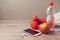 Fitness background with bottle of water, apple and smartphone