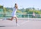 Fitness, balance and sport with woman tennis players practice competitive match at a sport court. Professional athlete