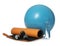 Fitness ball, yoga mat, bottle of water and dumbbells isolated