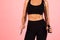 Fitness Banner. Unrecognizable Sporty Woman In Black Activewear Holding Jump Rope