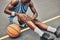 Fitness, basketball knee injury or pain while on basketball court holding leg in exercise, training or sport workout