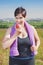 Fitness beautiful plus size woman eating apple