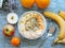 Fitness breakfast. muesli bowl with sliced banana. Muesli breakfast with oatmeal cereals raisins.