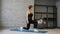 Fitness Caucasian woman doing lunges exercises for leg muscles workout training in gym. Active girl doing front forward one leg st