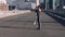 Fitness, city and woman stretching in the street before an outdoor workout on the highway. Sports, health and female